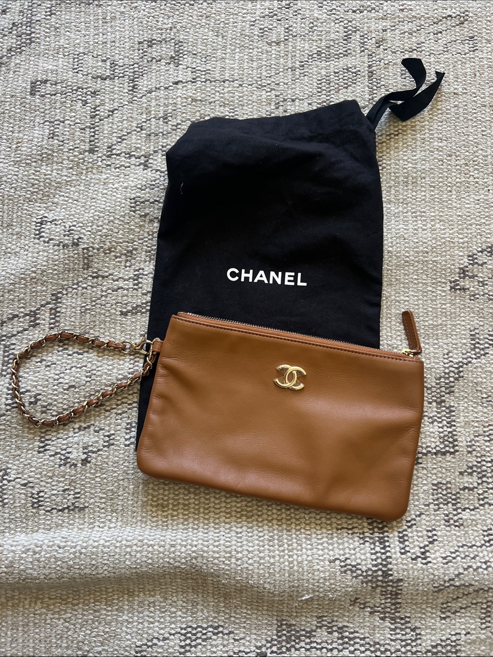 CHANEL Tan Leather Wristlet with Gold CC Emblem